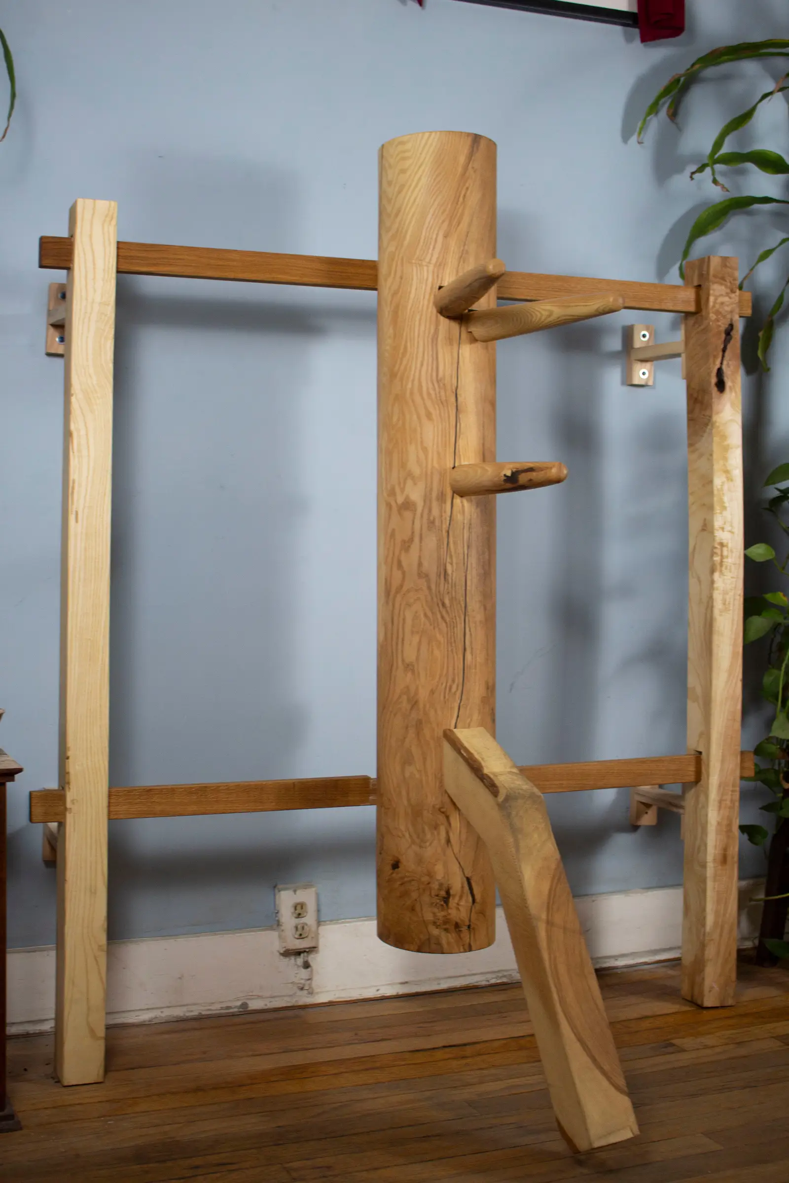 Handcrafted Wing Chun wooden dummy (Muk Yan Jong) — full view showing ash frame, arms, and leg